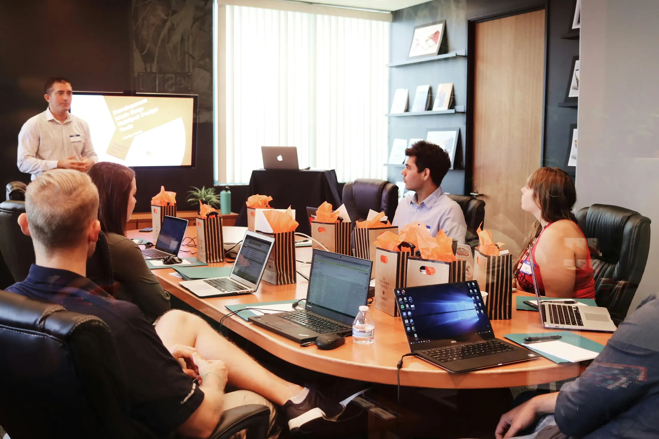 Corporate office with several teams working